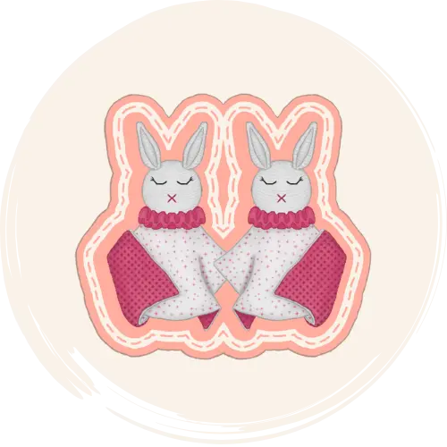 Un dessin qui représente deux doudous couvertures en version lapin